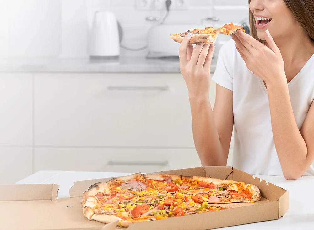 Tips for Eating Pizza After Getting a Tooth Pulled