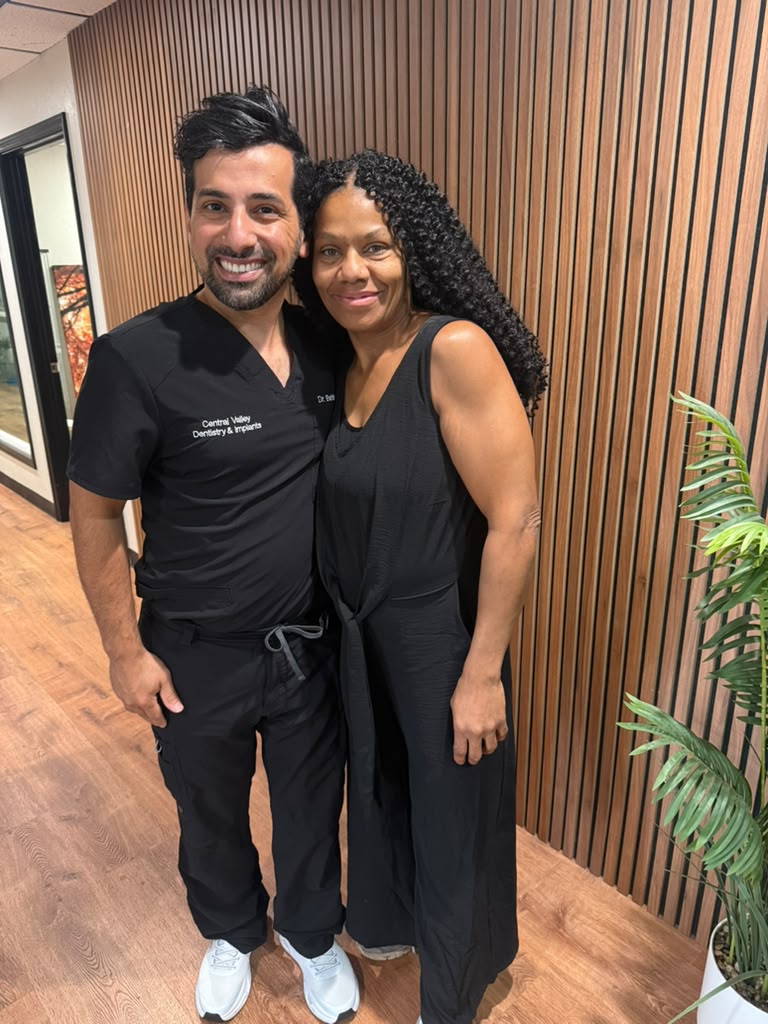 Dr. B with a smiling patient